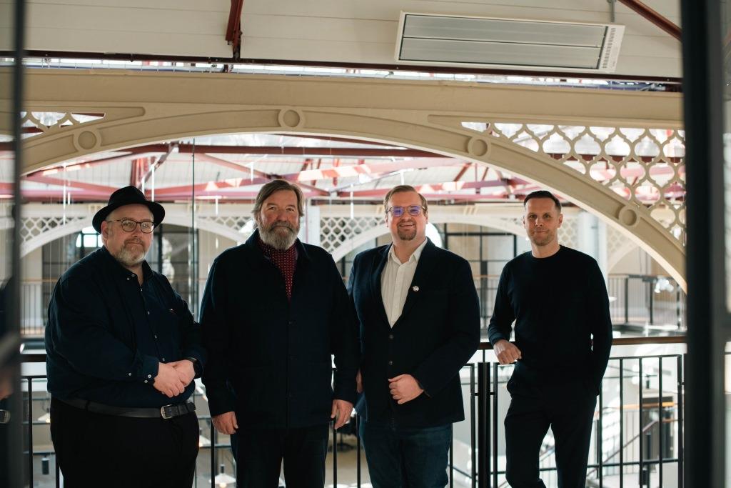 Councillors Anthony Mckeown and Damien Greenhalgh (left and third from left) with Matthew Mooney and Richard Walker from The Hospitality Collective on the new mezzanine level in the market hall.