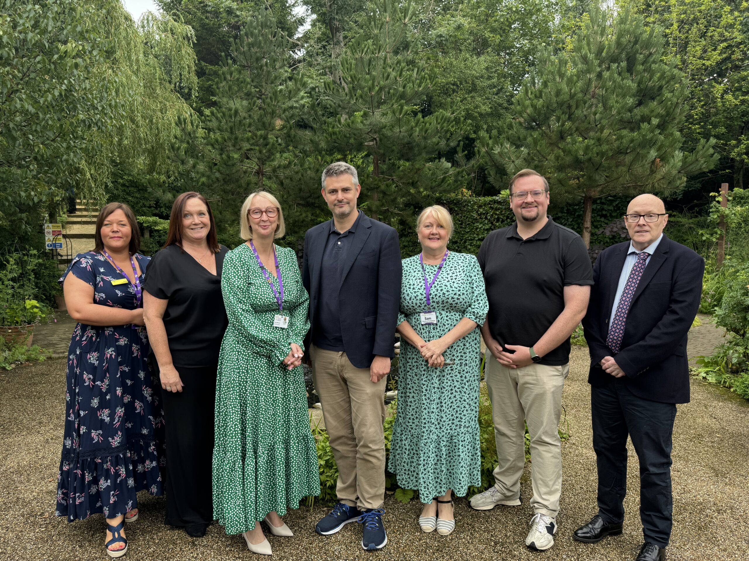Jon and Damien with SMT and Chairman in gardens